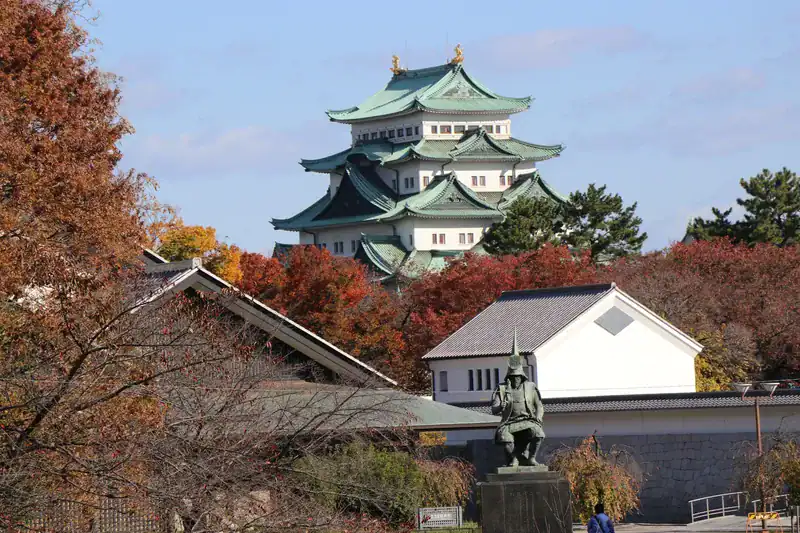 Nagoya Castle framed by autumn foliage